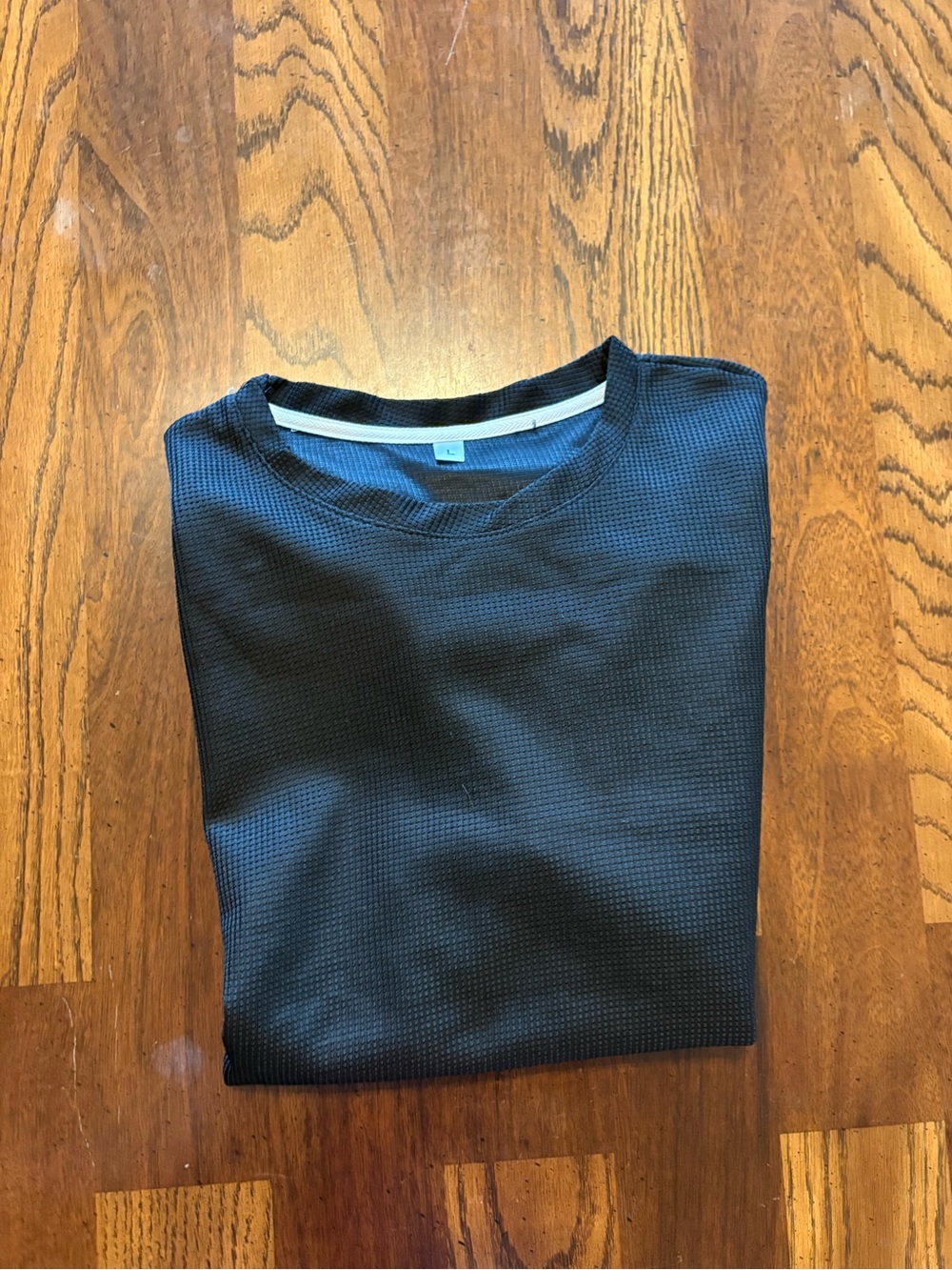 Classic Black Textured mesh Crewneck shirt.
